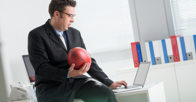 Guy with ball on the laptop